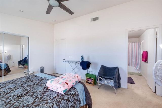 carpeted bedroom featuring ceiling fan