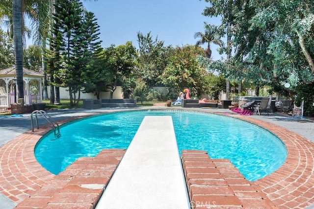 4645 Ledge Ave, Toluca Lake, CA 91602 - view of pool with a diving board, a gazebo, and a patio area