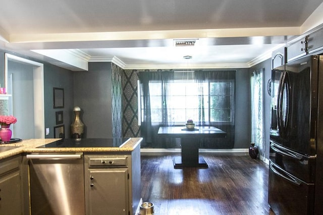 4645 Ledge Ave, Toluca Lake, CA 91602 - kitchen with freestanding refrigerator, stainless steel dishwasher, dark wood-style floors, ornamental molding, and light countertops