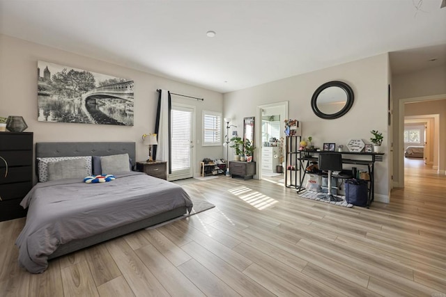 bedroom with light hardwood / wood-style flooring