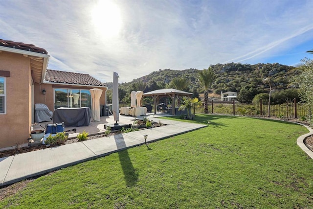 view of yard with a patio and a gazebo