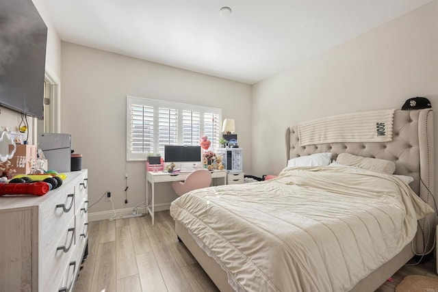 bedroom featuring light wood-type flooring