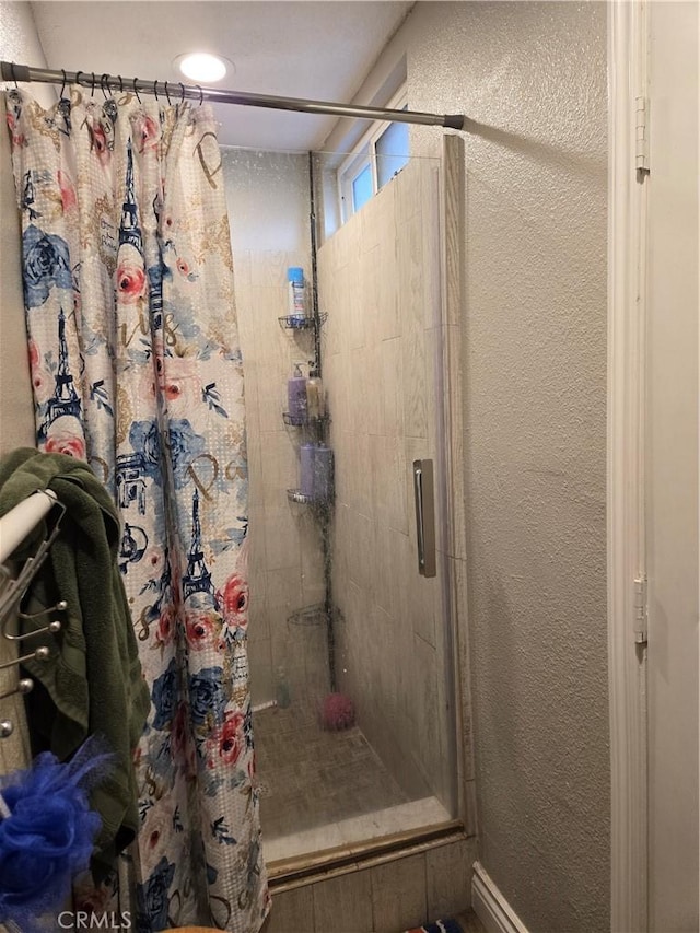 bathroom featuring curtained shower