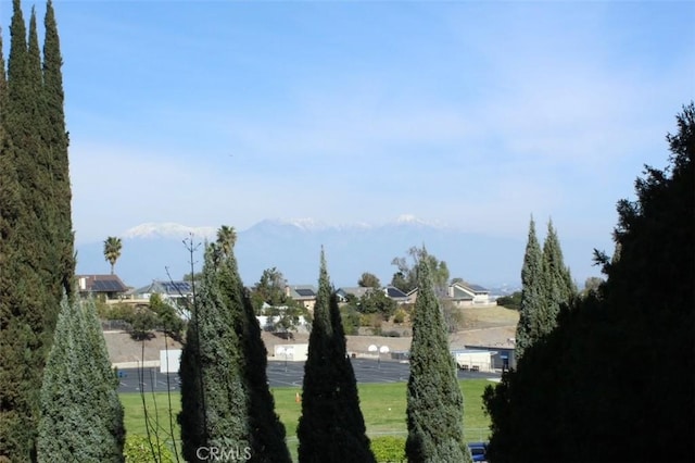 view of home's community featuring a residential view and a mountain view