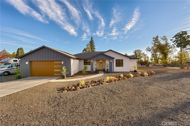 modern farmhouse featuring a garage