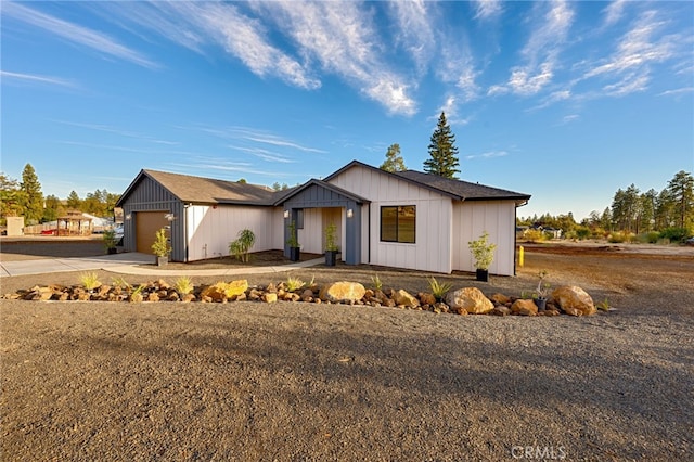 modern farmhouse featuring a garage