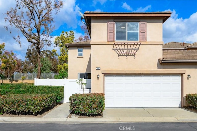 view of property with a garage