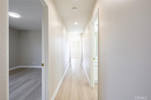 hallway featuring light hardwood / wood-style floors