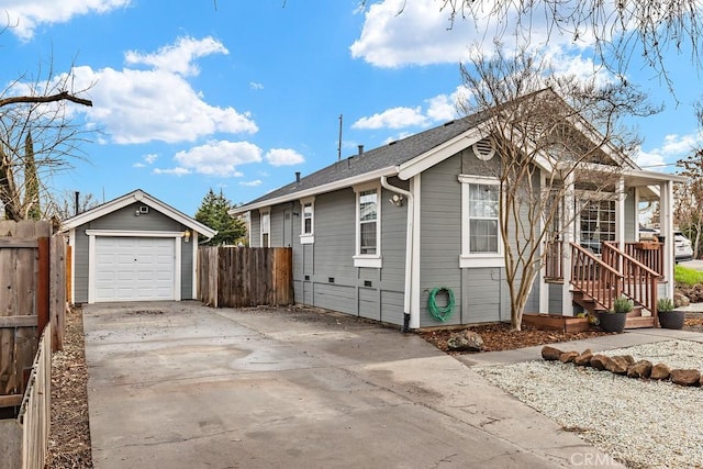 view of front of home featuring an outdoor structure and a garage