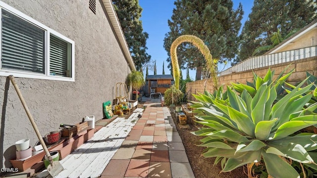 view of yard featuring a patio and a fenced backyard