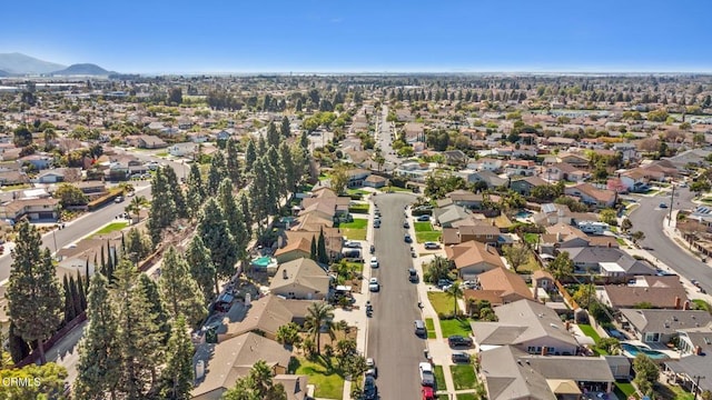 bird's eye view with a residential view and a mountain view