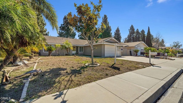 ranch-style house with driveway and an attached garage