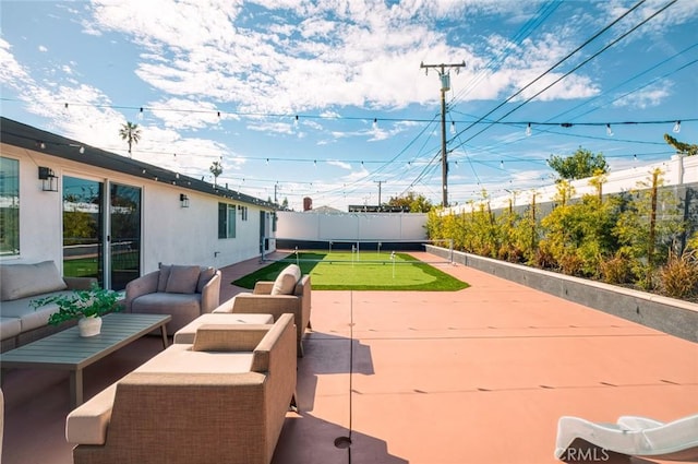 view of patio / terrace featuring a fenced backyard and outdoor lounge area