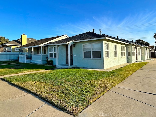 ranch-style house with a front yard