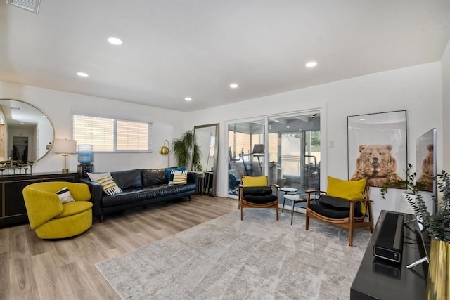 living room with light hardwood / wood-style floors