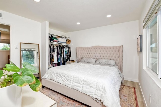 bedroom featuring a closet and wood-type flooring