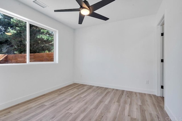 unfurnished room with light hardwood / wood-style floors and ceiling fan