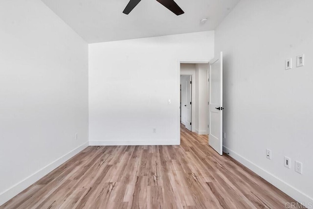 empty room with light hardwood / wood-style flooring and ceiling fan