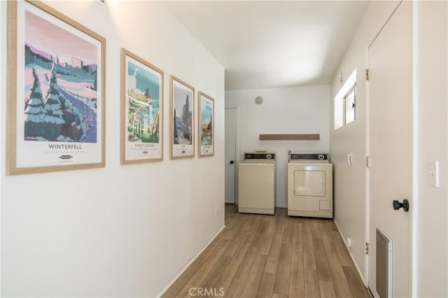 188 S Finch Dr, Big Bear Lake, CA 92315 - laundry room featuring washing machine and clothes dryer, wood finished floors, and baseboards