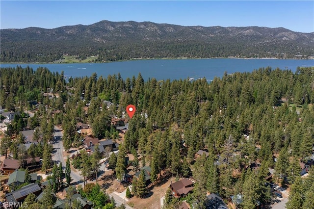 bird's eye view featuring a water and mountain view