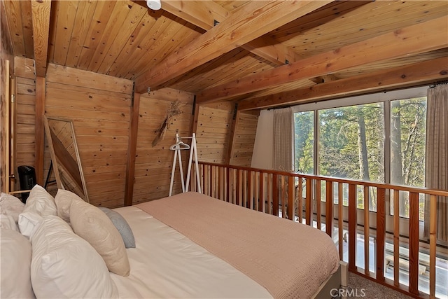 bedroom with vaulted ceiling with beams, wooden walls, and wood ceiling