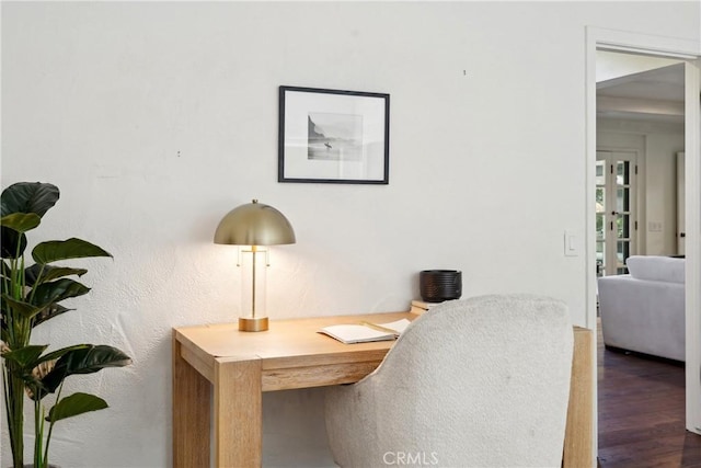 home office with dark wood-style floors