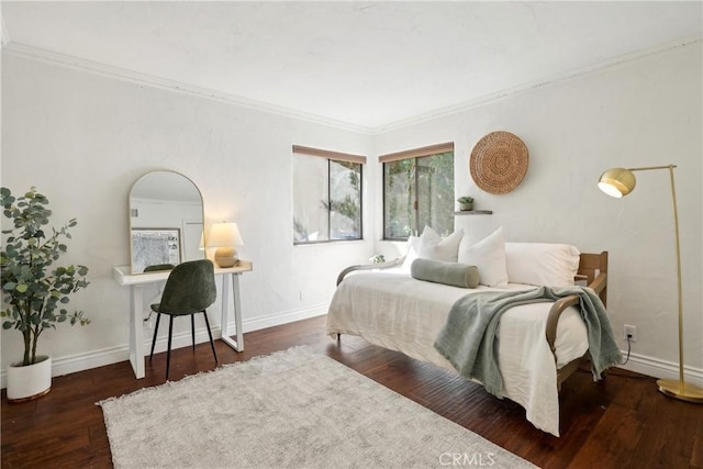 bedroom with baseboards, ornamental molding, arched walkways, and dark wood-style flooring