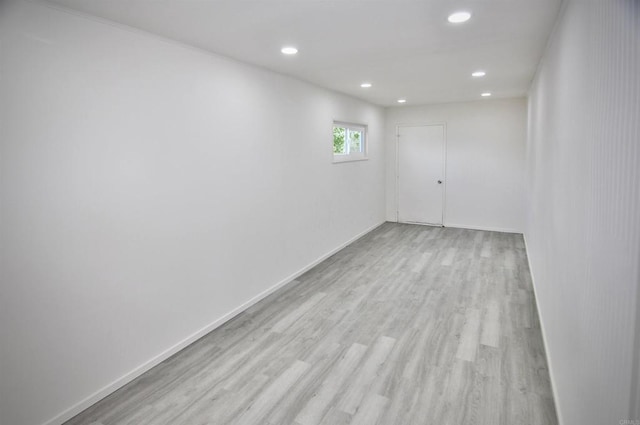 unfurnished room featuring light hardwood / wood-style flooring