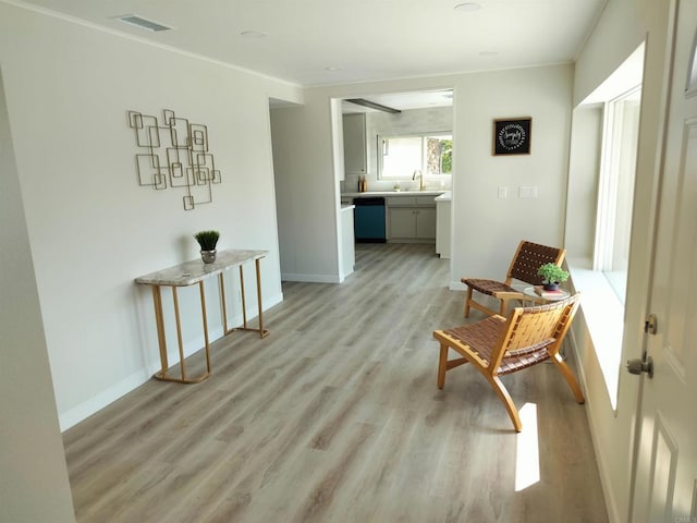 844 Hamilton Ln, Fallbrook, CA 92028 - sitting room with light wood-style floors, baseboards, and crown molding