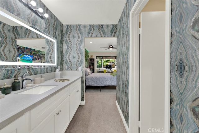 bathroom with vanity and ceiling fan