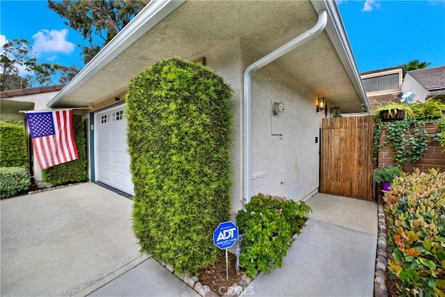 entrance to property featuring a garage