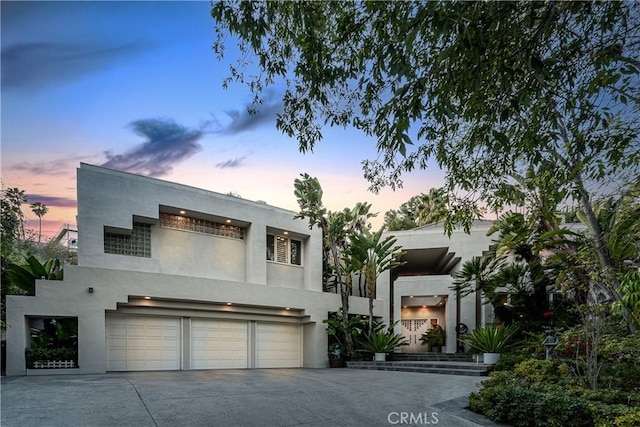 modern home featuring a garage