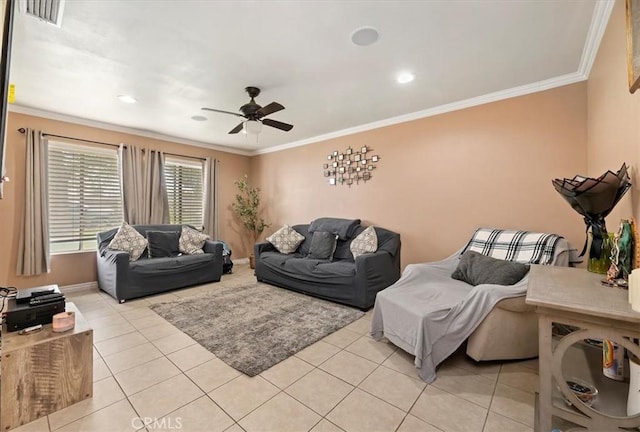 tiled living room featuring ceiling fan and crown molding