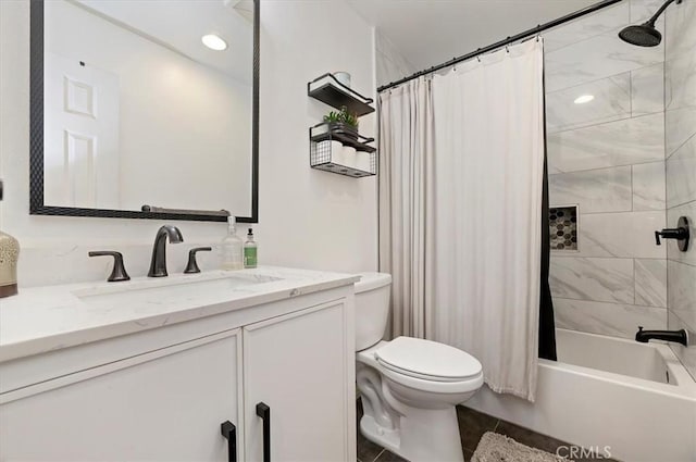 full bathroom featuring shower / tub combo, vanity, tile patterned flooring, and toilet