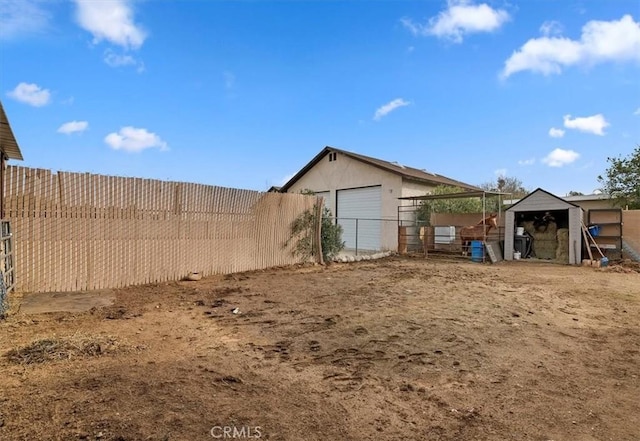 exterior space featuring an outdoor structure