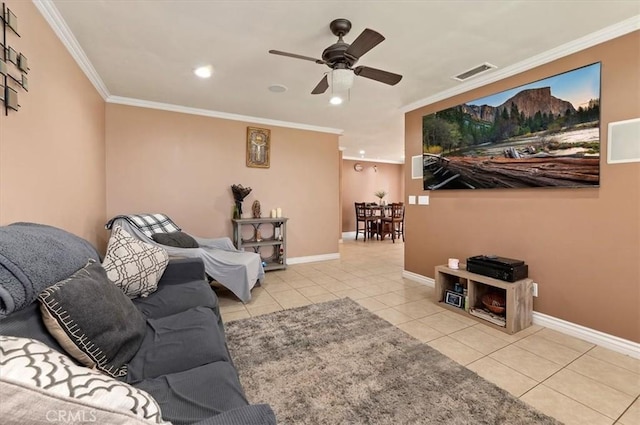 tiled living room featuring ceiling fan and crown molding