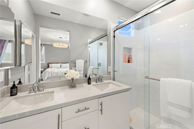 bathroom with vanity and walk in shower
