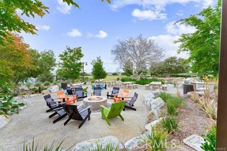 view of patio with an outdoor fire pit
