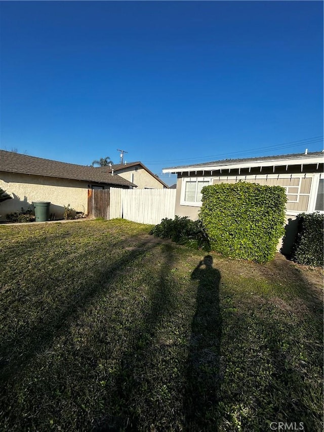 view of yard with fence