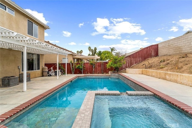 view of swimming pool with a pergola, a patio, a pool with connected hot tub, and a fenced backyard
