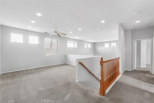 interior space featuring recessed lighting, carpet, baseboards, and ceiling fan