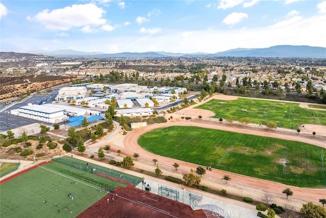 birds eye view of property with a mountain view