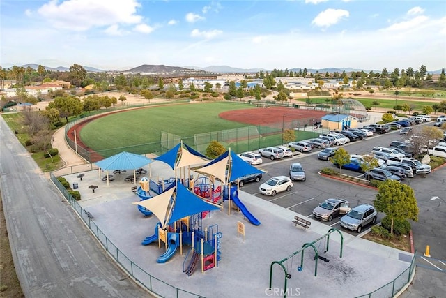 birds eye view of property featuring a mountain view