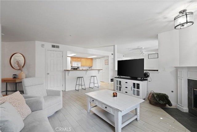 living room with ceiling fan