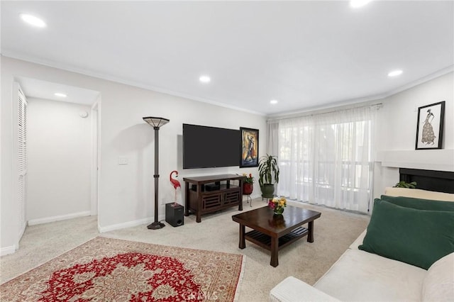 living room with ornamental molding and light colored carpet