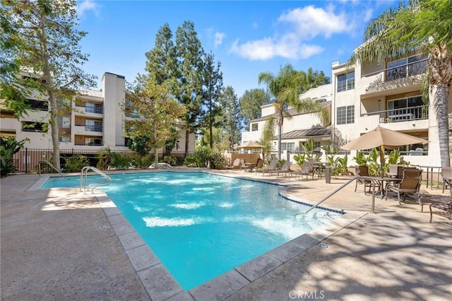 view of pool featuring a patio