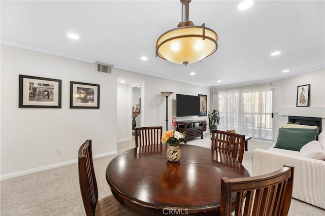 view of carpeted dining space