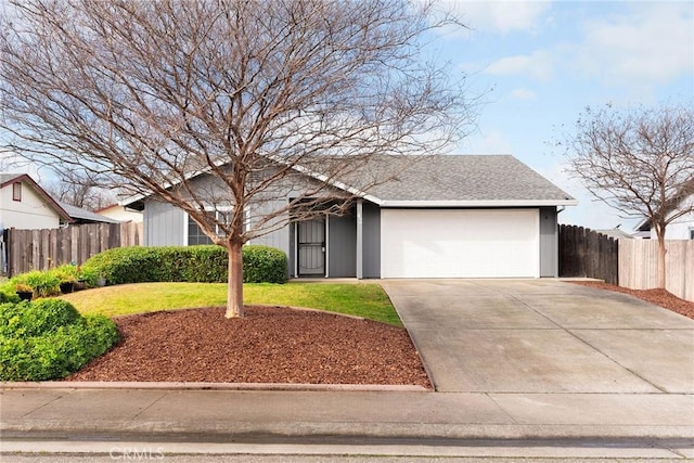 view of front facade featuring a front lawn and a garage