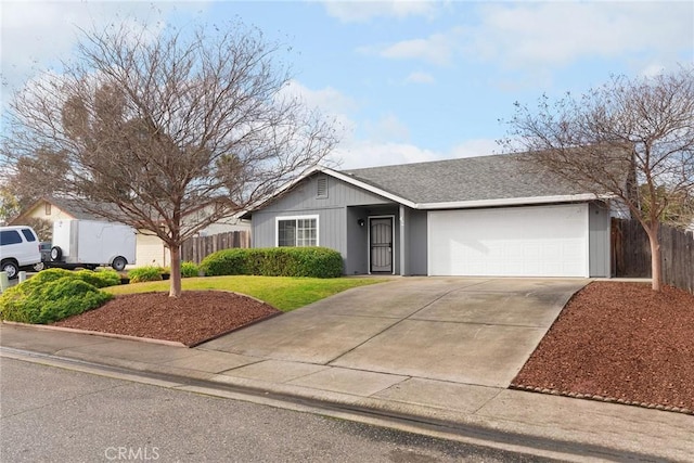 ranch-style house featuring a garage