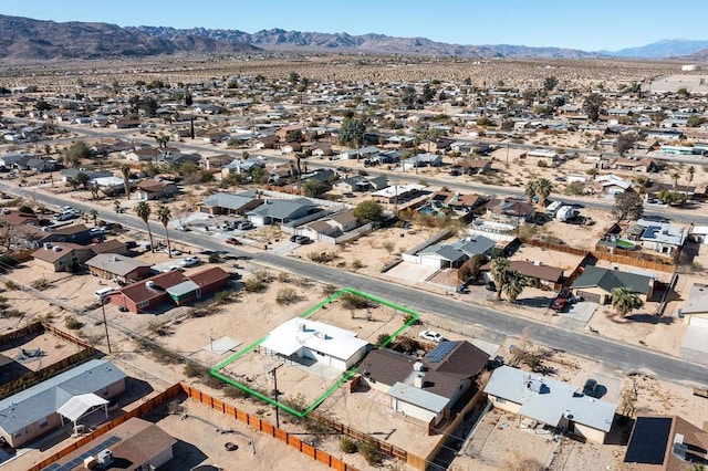 aerial view featuring a mountain view